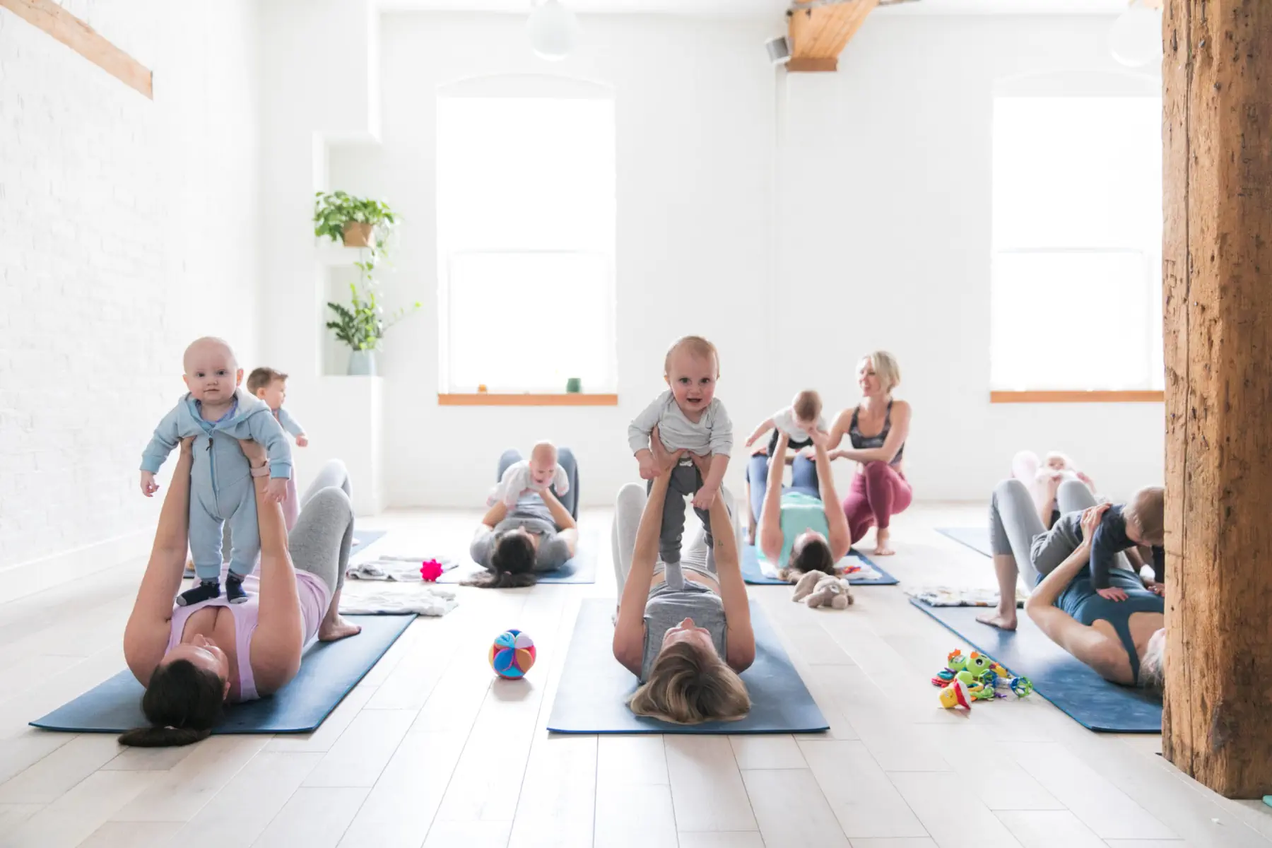 moms with babies on mat